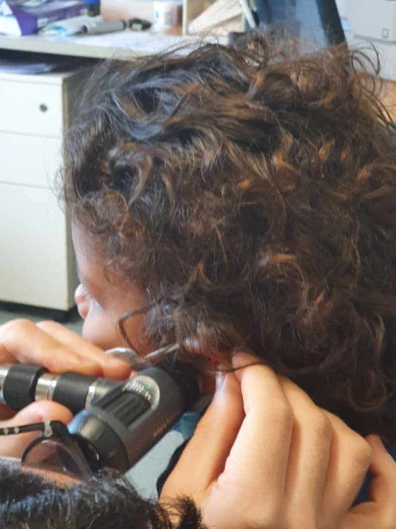 Eye and ear practitioner looking out for his patients - Hearing ...