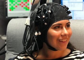 Trialling the world first fNIRS tinnitus diagnostic cap at the Bionics Institute in Melbourne. Image: Bionics Institute.