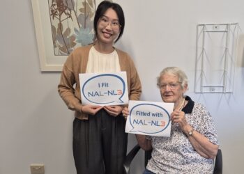 One of Australia's first patients to be fitted using the new software, Barbara, is pictured with Hearing Australia innovation audiologist Charlette Li from NSW. Image: Hearing Australia.