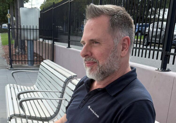 David McMaster said speech is clear and crisp and at a really good volume with his GN hearing aid fitted with the NAL-NL3 fitting formula by Hearing Australia. Image: Hearing Australia.