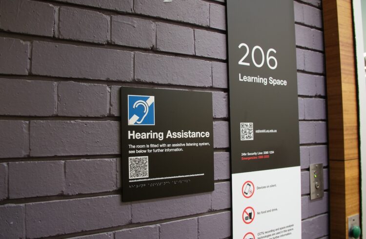 Each lecture theatre has been fitted with a QR code which provides more information on how to access the technology. Image: The University of Queensland.