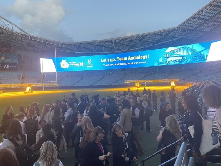Delegates survey the playing field in Sydney's Accor Stadium during the welcome reception.  Image: Prime Creative Media.