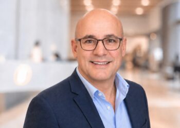 Hearing Australia client Chris Pappas said that having his hearing restored with hearing aids was life-changing. Image: Hearing Australia.