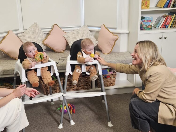 Identifical twin brothers Jack and Artie with their mum Emily Porter on the day their cochlear implants were activated and they heard their first sounds. Image: The Shepherd Centre.